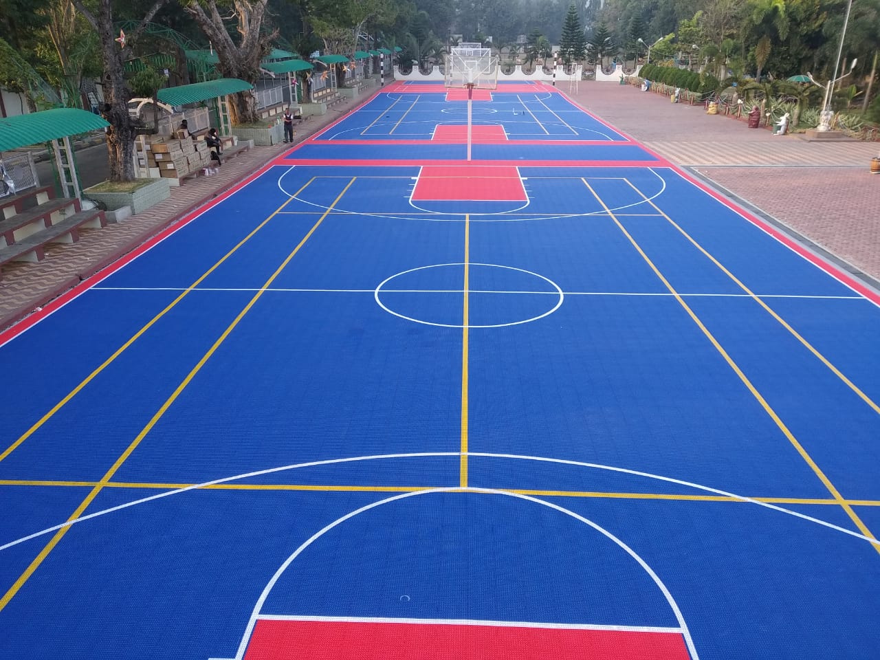 Completed blue and red interlocking basketball court