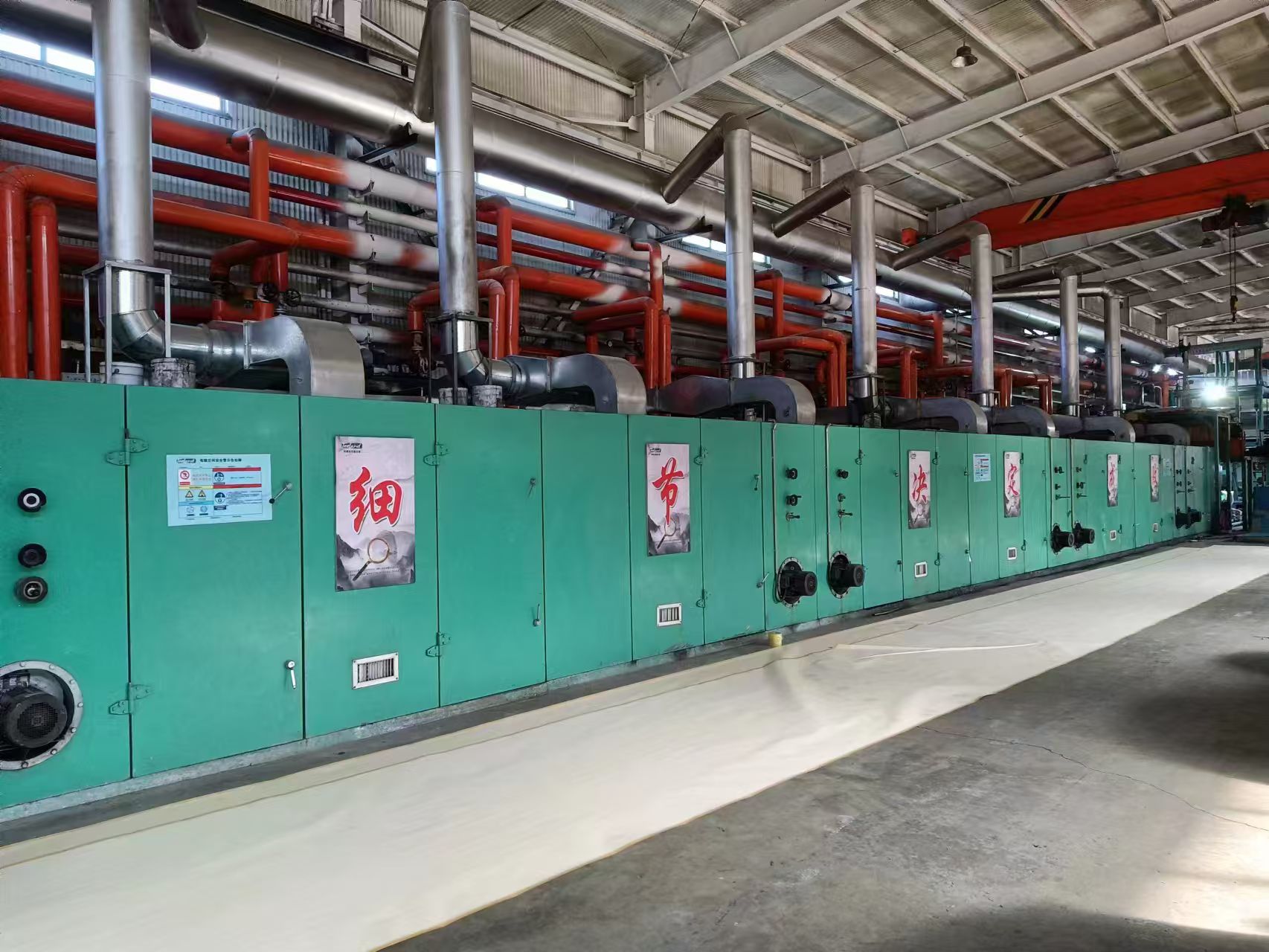 Flooring production equipment inside the manufacturing workshop
