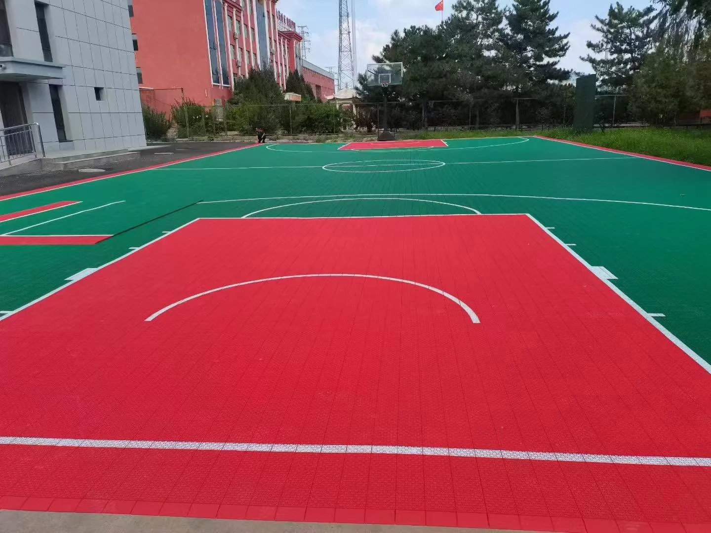 A ground-level view across the second basketball layout.